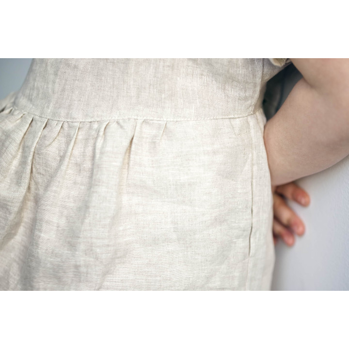 Lniana sukienka dziecięca Liten Lisa (naturalna)